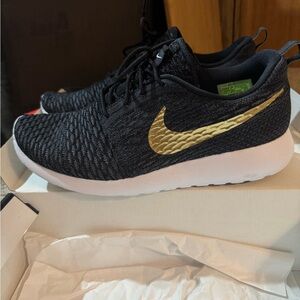 Nike Black and Gold Athletic Shoes